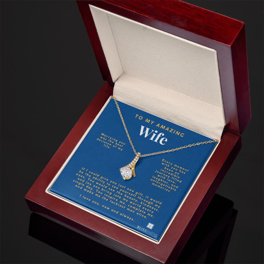 Image shows a pendant necklace for My Amazing Wife with a heartfelt message on a blue background on BlissLiving.com.