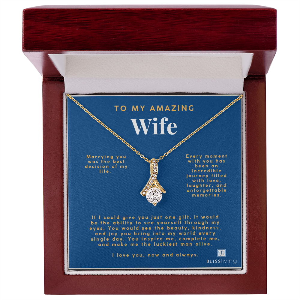 Image shows a pendant necklace for My Amazing Wife with a heartfelt message on a blue background on BlissLiving.com.