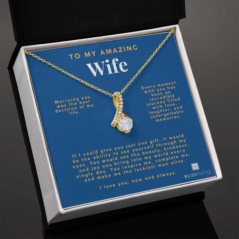 Image shows a pendant necklace for My Amazing Wife with a heartfelt message on a blue background on BlissLiving.com.