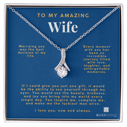 Image shows a pendant necklace for My Amazing Wife with a heartfelt message on a blue background on BlissLiving.com.